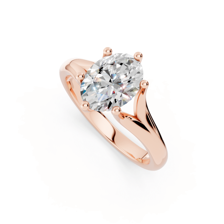 Stunning 10KT Rose Gold Oval Lab Grown Diamond Split Shank Engagement Ring featuring a 1.00 carat IGI certified D-F VS diamond.